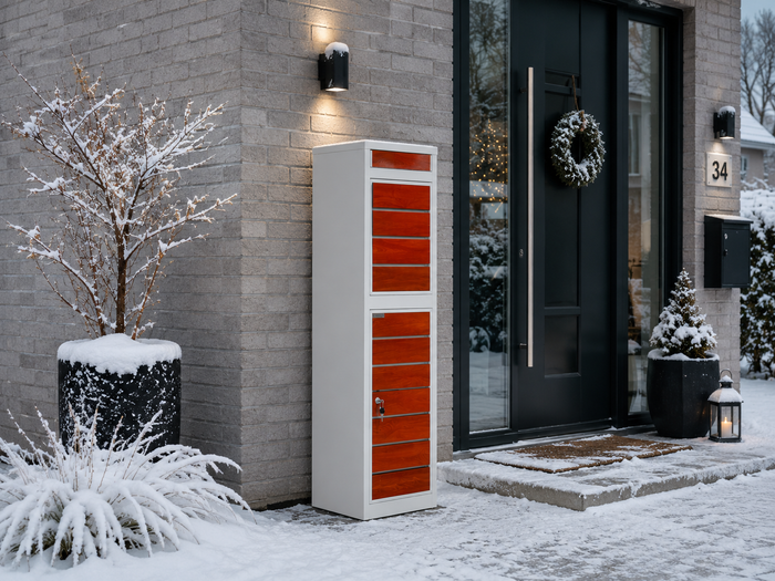 White BunnyBox Style with teak front by a front door in the snow